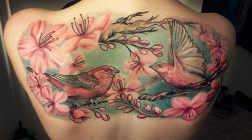 Birds-Across-Back-Tattoo-672x372.jpg